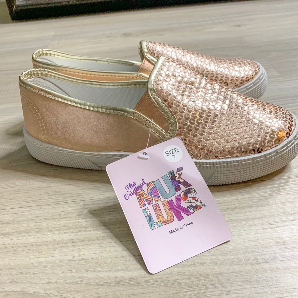Muk Luk’s metallic pink shoes